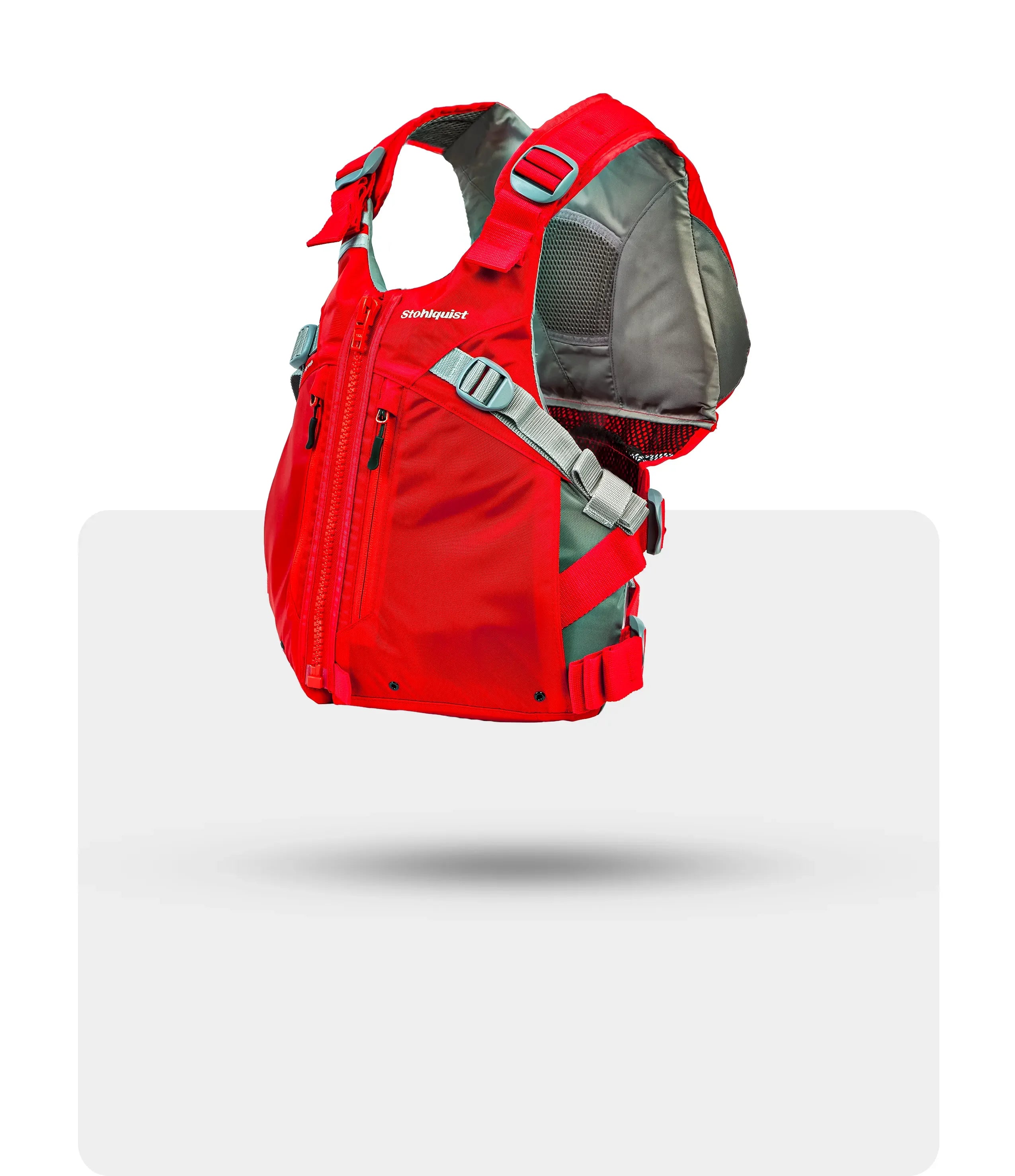 Red Stohlquist Trekker life jacket with gray adjustable straps and front zipper on white background