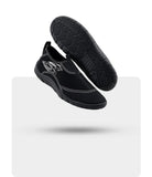 Pair of black Stohlquist Reef Water Shoes showing the top and textured sole.